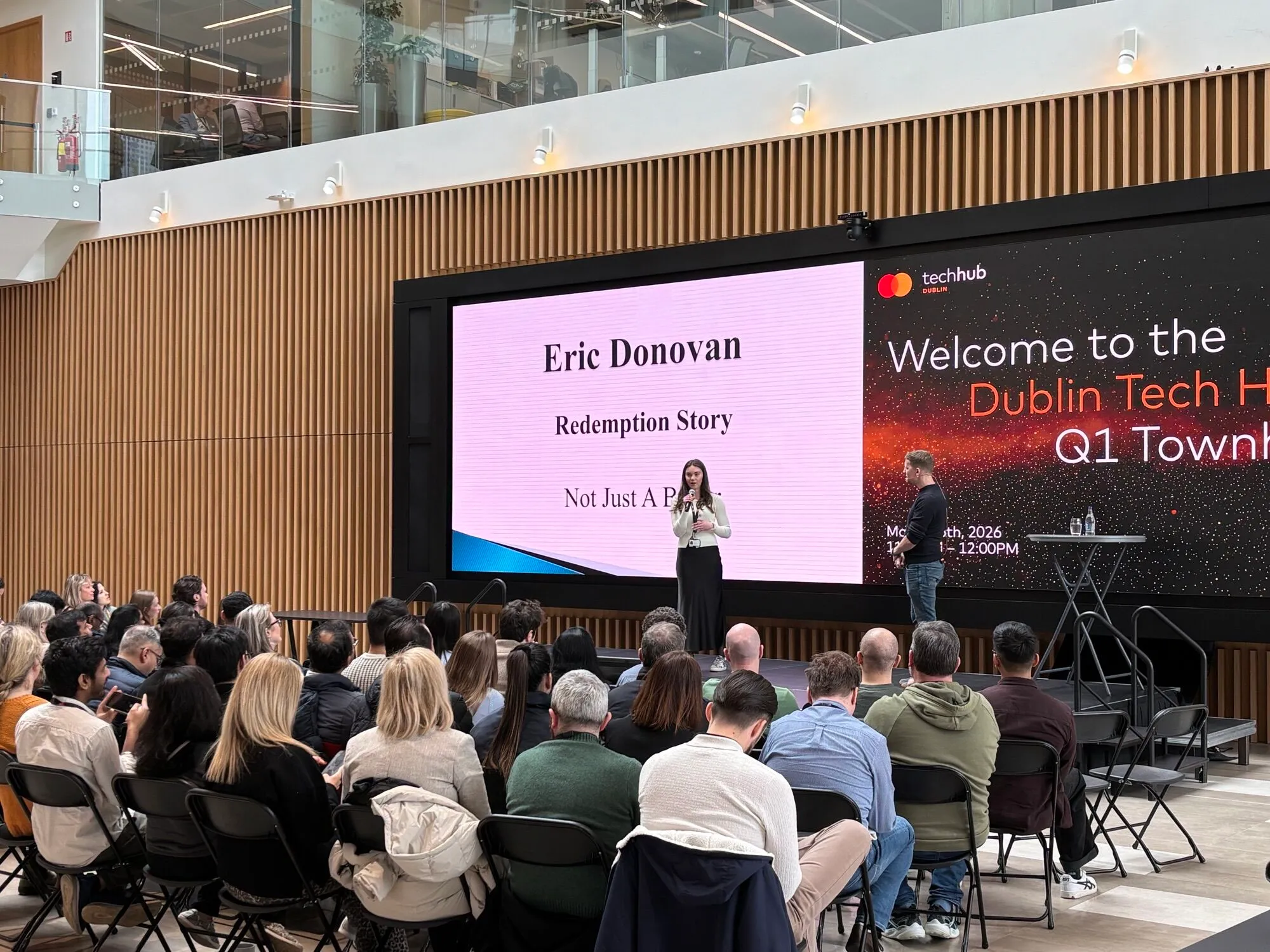 Anna Sofia speaking on stage at the Mastercard Dublin Tech Hub Q1 townhall